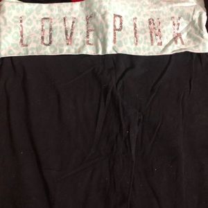 Pink bling boot cut leggings in a size large